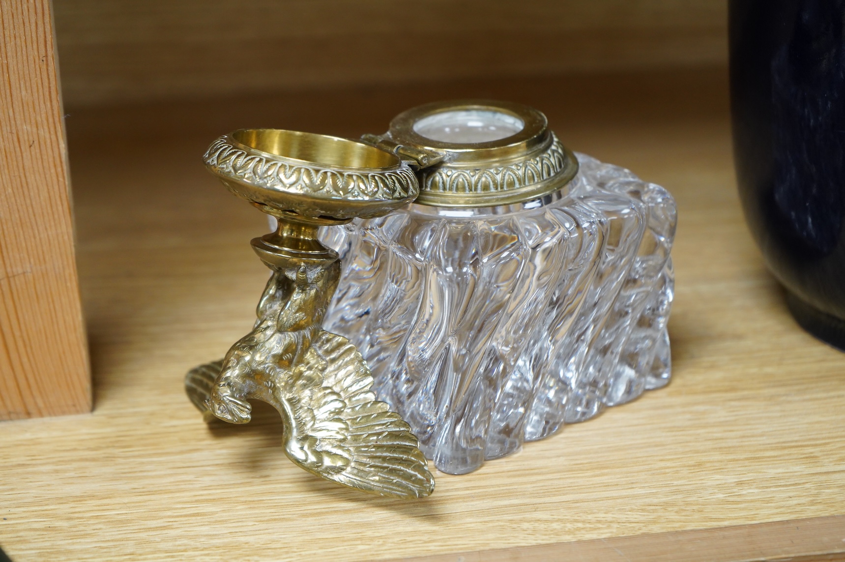 A large and heavy French Empire style bronze and glass inkwell, 20cm